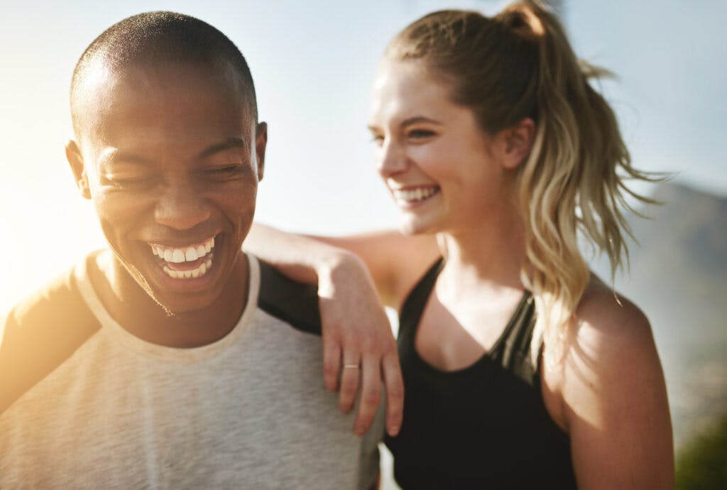 Shot of a fit young couple working out together outdoors