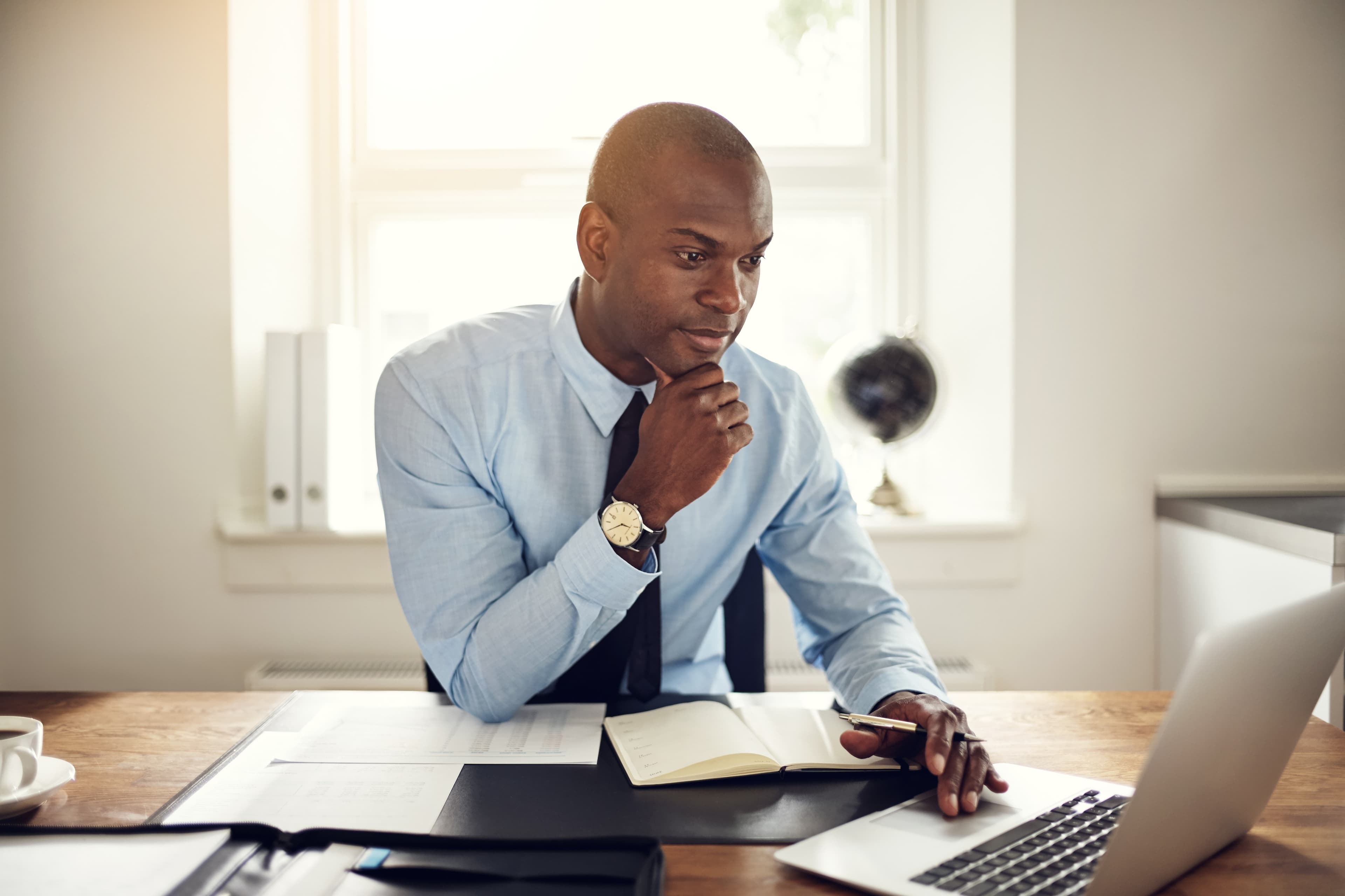 Business Man Working on Laptop