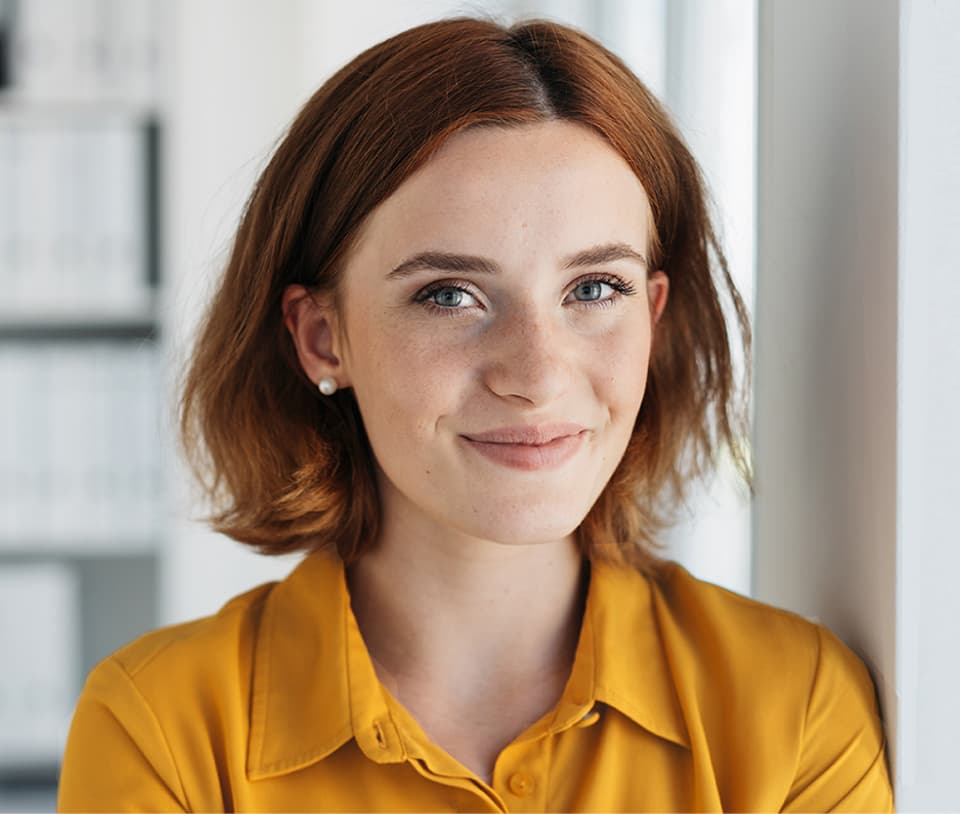 girl yellow shirt red hair